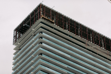 building construction site against sky background. construction of new buildingの写真素材