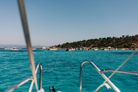Sithonia, GREECE - August 29, 2019: blue lagoon turquoise bay and beaches in Diaporos paradise...