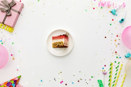 Birthday party background. party hats, balloons, streamers and confetti with copy spaceの写真素材