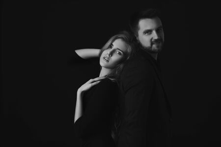 elegant fashion couple. man and beautiful woman in dress. black and whiteの写真素材