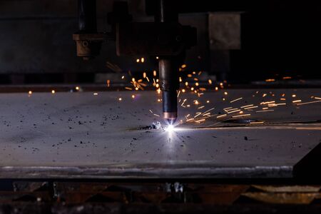 Plasma cutting of metal with a cnc. Plasma cutting machine cutting steel sheet. Laser cutter in...