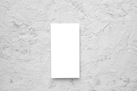 Blank flyer. Empty card on cement texture background. Mockup template. top view