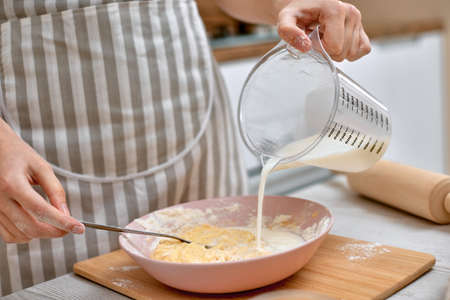 housewife cooking on kitchen at the home.