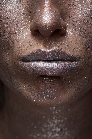 Fashion model woman in silver bright sparklesの写真素材