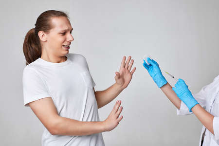 Scary man during coronavirus vaccination, covid-19 immunization.