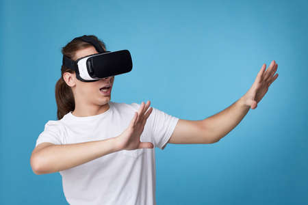 Young man using virtual reality headset. VR gadgets