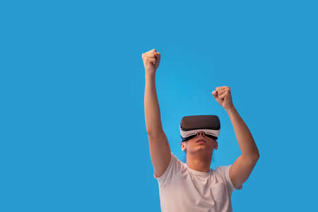 Young man using virtual reality headset. VR gadgets