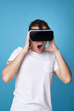 Young man using virtual reality headset. VR gadgetsの写真素材