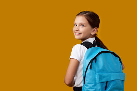 adorable schoolgirl with backpack. Back to schoolの写真素材