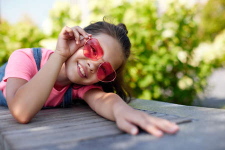portrait of happy child girl in the park