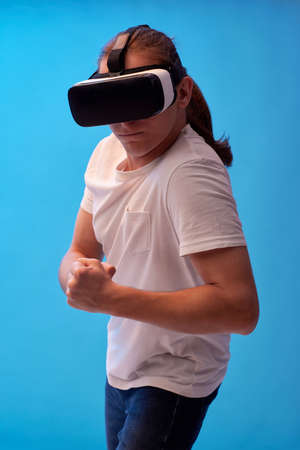 Young man using virtual reality headset. VR gadgets