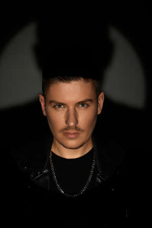 stylish handsome sexy man in black leather jacketの写真素材