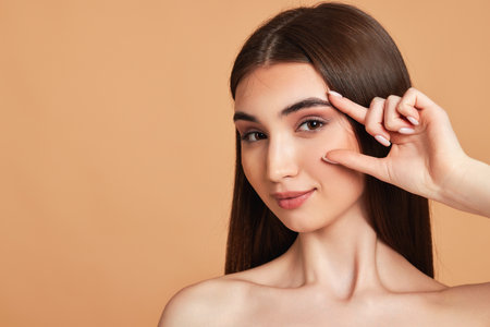 Beautiful young woman with perfect clean skinの写真素材