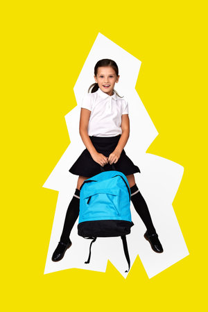 cute happy schoolgirl jumping up with backpack