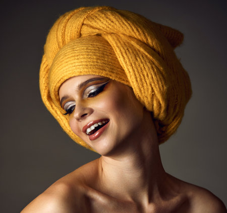 Beauty blonde model girl with fashionable creative make-upの写真素材