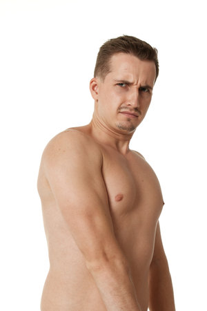 young man showing his bicep over white backgroundの写真素材