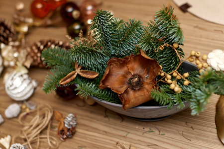 Homemade Craft christmas tools and decorations on tableの写真素材