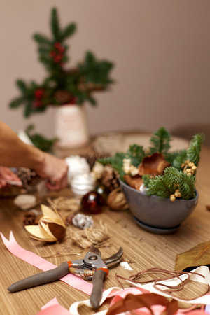 Homemade Craft christmas tools and decorations on tableの写真素材