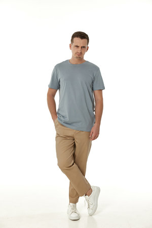 offended frustrated young man on white background. sadnessの写真素材
