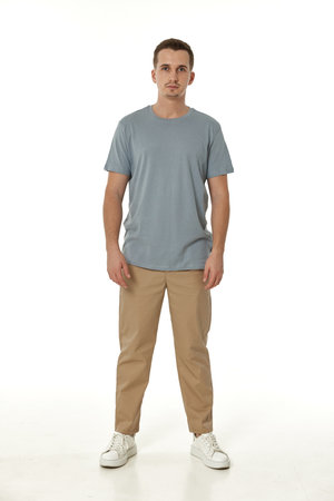 handsome young calm man on white backgroundの写真素材