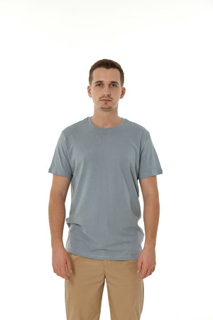 handsome young calm man on white backgroundの写真素材