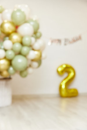Many white green and gold balloons and Happy Birthday golden texts , party evenの写真素材