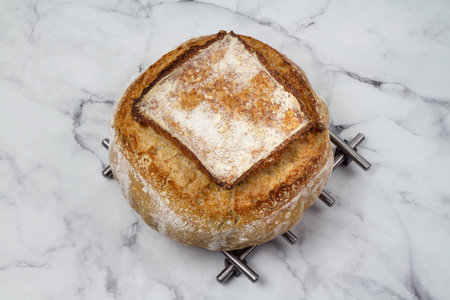 Homemade rye and white flour sourdough tartine bread.