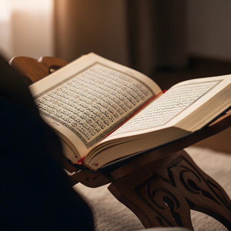 Open Quran book on carved wooden stand showing Arabic text with soft natural light in cozy settingの素材