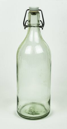 Real glass bottle isolated on white backgroundの写真素材