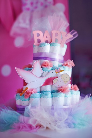 Cake from kid diapers, present on baby shower party.の写真素材
