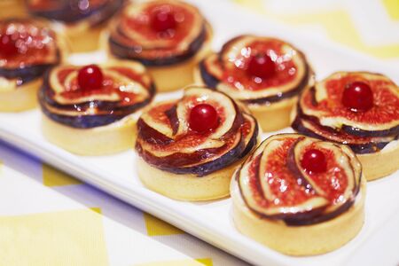 Very sweet delicious small cakes made from berries and figs for candy barの写真素材