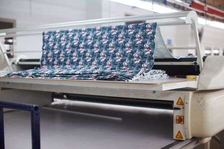 Ð¡oil unwinding machine at cloths factory