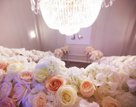 Decorated with flowers ladder for ceremonyの写真素材