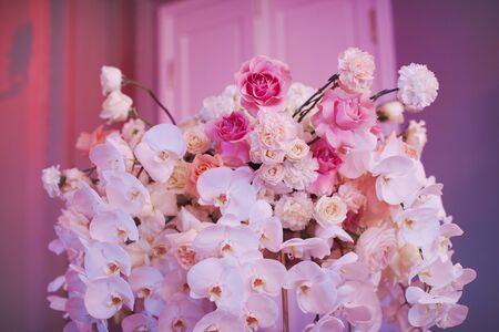Luxury decorated with flowers roses and orchids celebration hall in palaceの写真素材