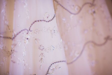 Detail of stitched lace net luxury wedding dress
