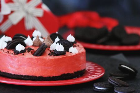 Oreo cake red with cream and cookies