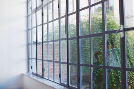 Vintage window with many sells metallic in old house