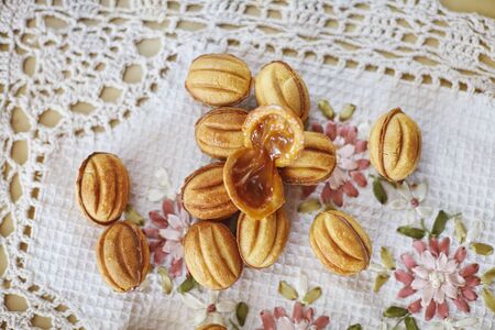 Traditional russian festive cookies in nut shape with caramelized milk inside