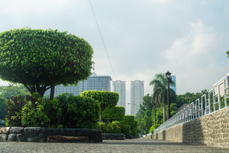 Rizal Park, Manila, Philippines July 2, 2014: Sculpted Shrubs along Abenida Maria Orosa at the Rizal Park in Manila, Philippinesのeditorial素材