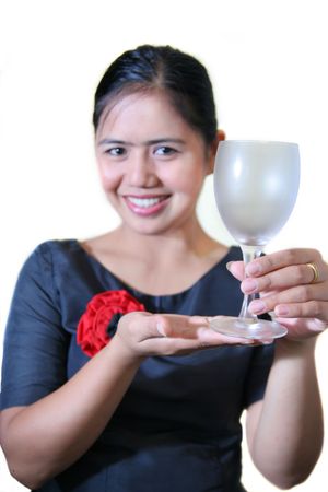 bar staff showing cold glassの写真素材