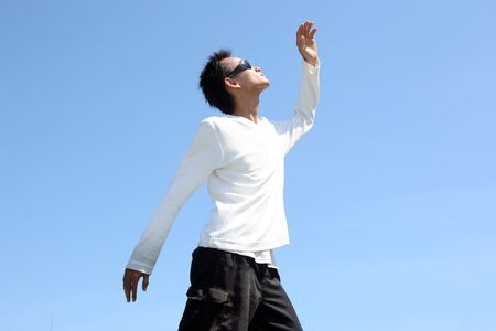 man under hot sun shine in tropical weather