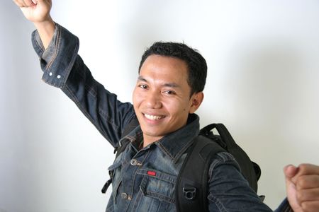 Man with jacket and backpackの写真素材