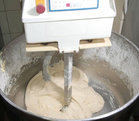 Pastry dough in mixer machineの写真素材