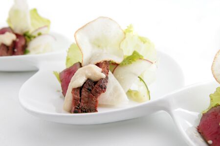 Grilled tuna pastrami with white radishの写真素材