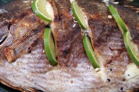 close up of grilled fish skin texture