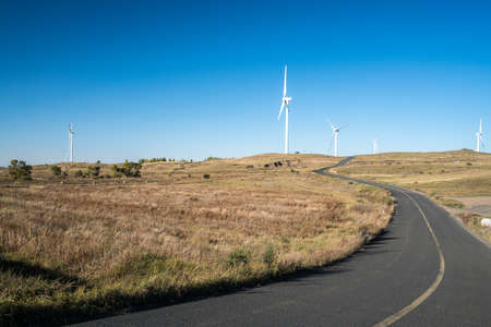 The highway and windmill at Chinaの写真素材
