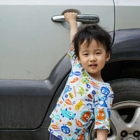 Children and carsの写真素材
