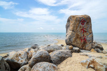 stone carving beside beachの写真素材