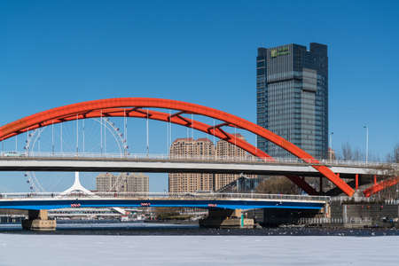 Bridge over the sea river in winterのeditorial素材