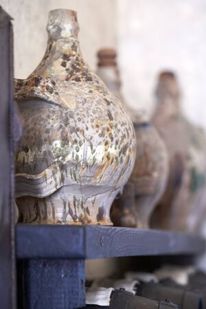 An antique glass demijohn for vinegarの写真素材